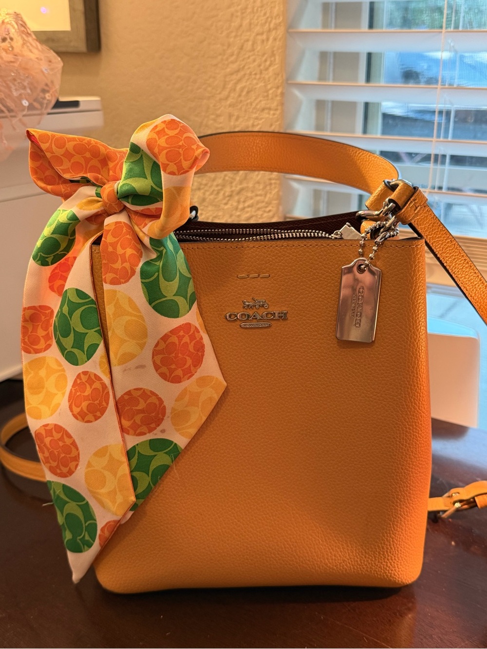 Coach Yellow Pebbled Leather Bucket Bag with Coach Scarf Accent